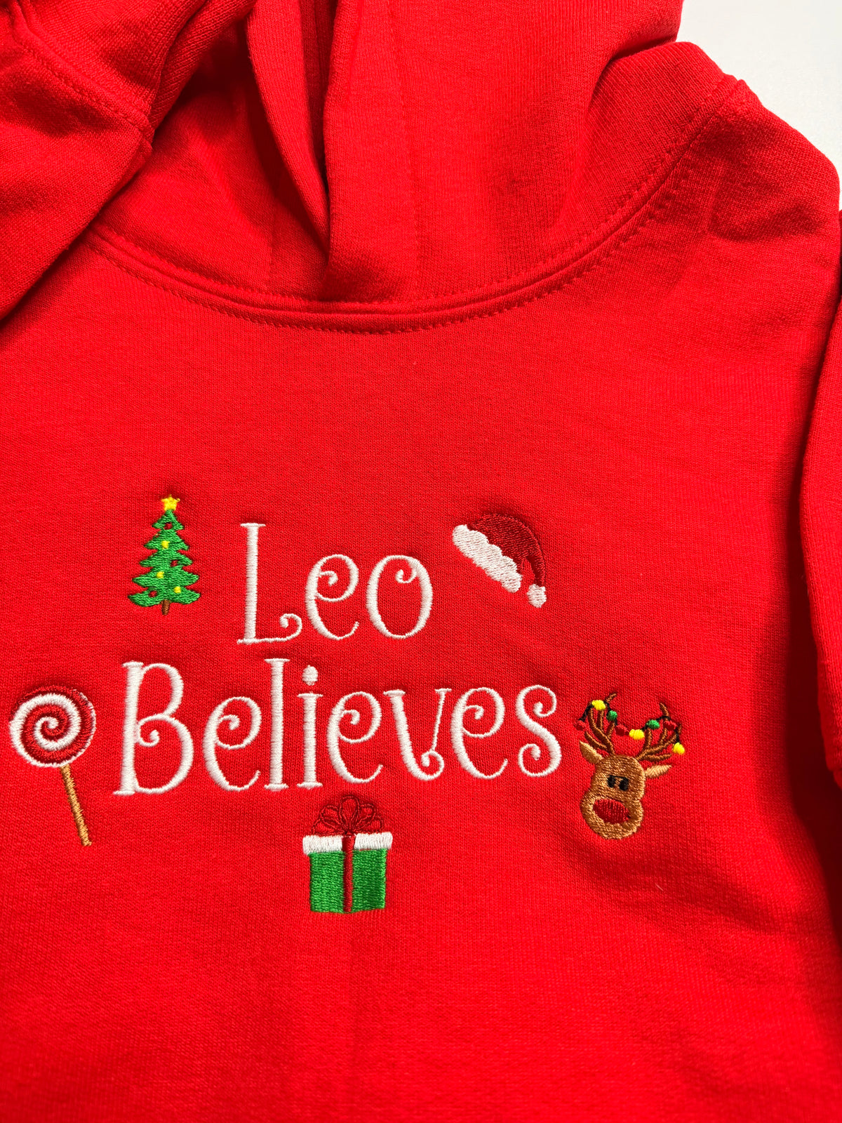 Embroidered Christmas "(Child's Name) Believes" Hooded Sweatshirt
