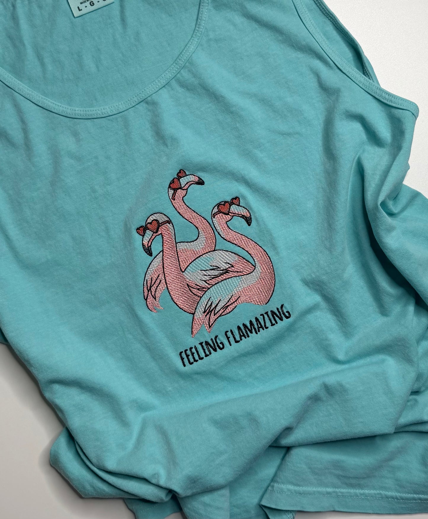Lagoon Blue shirt with Flamingos in sunglasses. Perfect for hot summer days.
