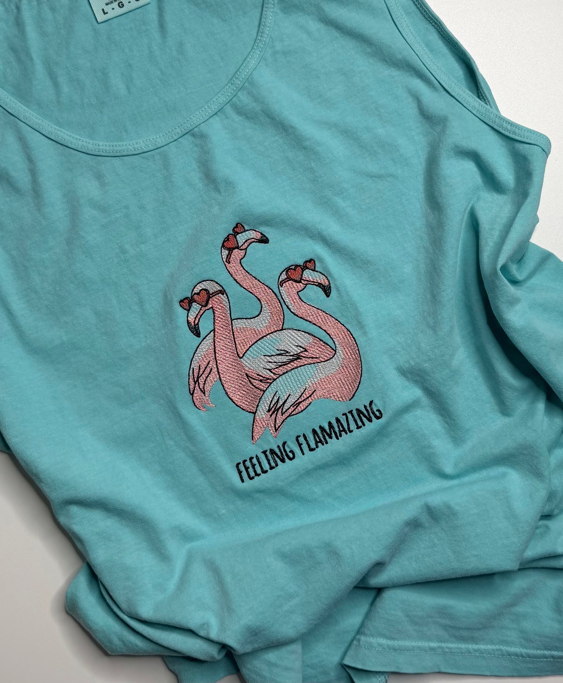 Lagoon Blue shirt with Flamingos in sunglasses. Perfect for hot summer days.