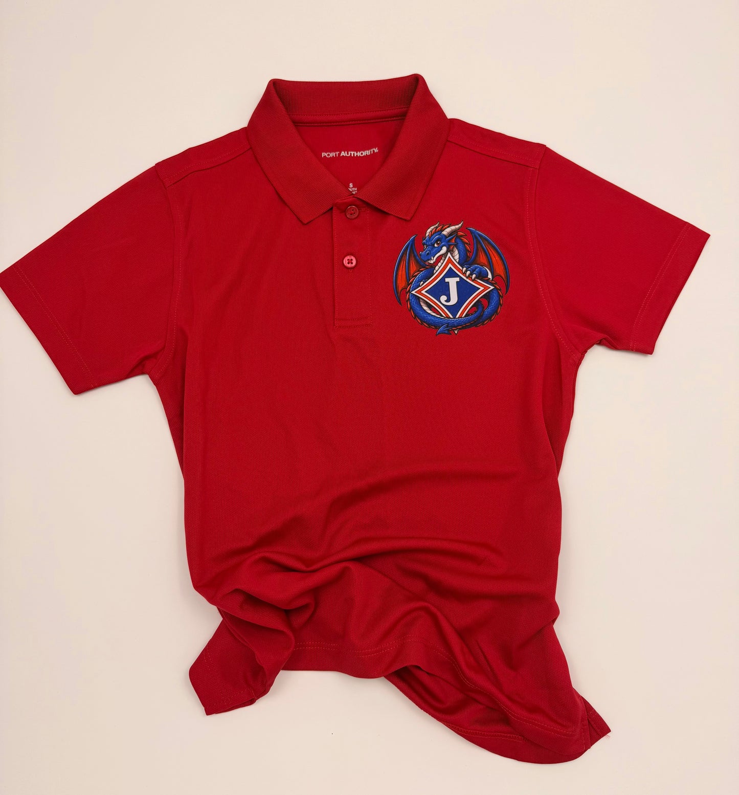 Youth Moisture Wicking Polo with DTF print of Dragon and School Logo