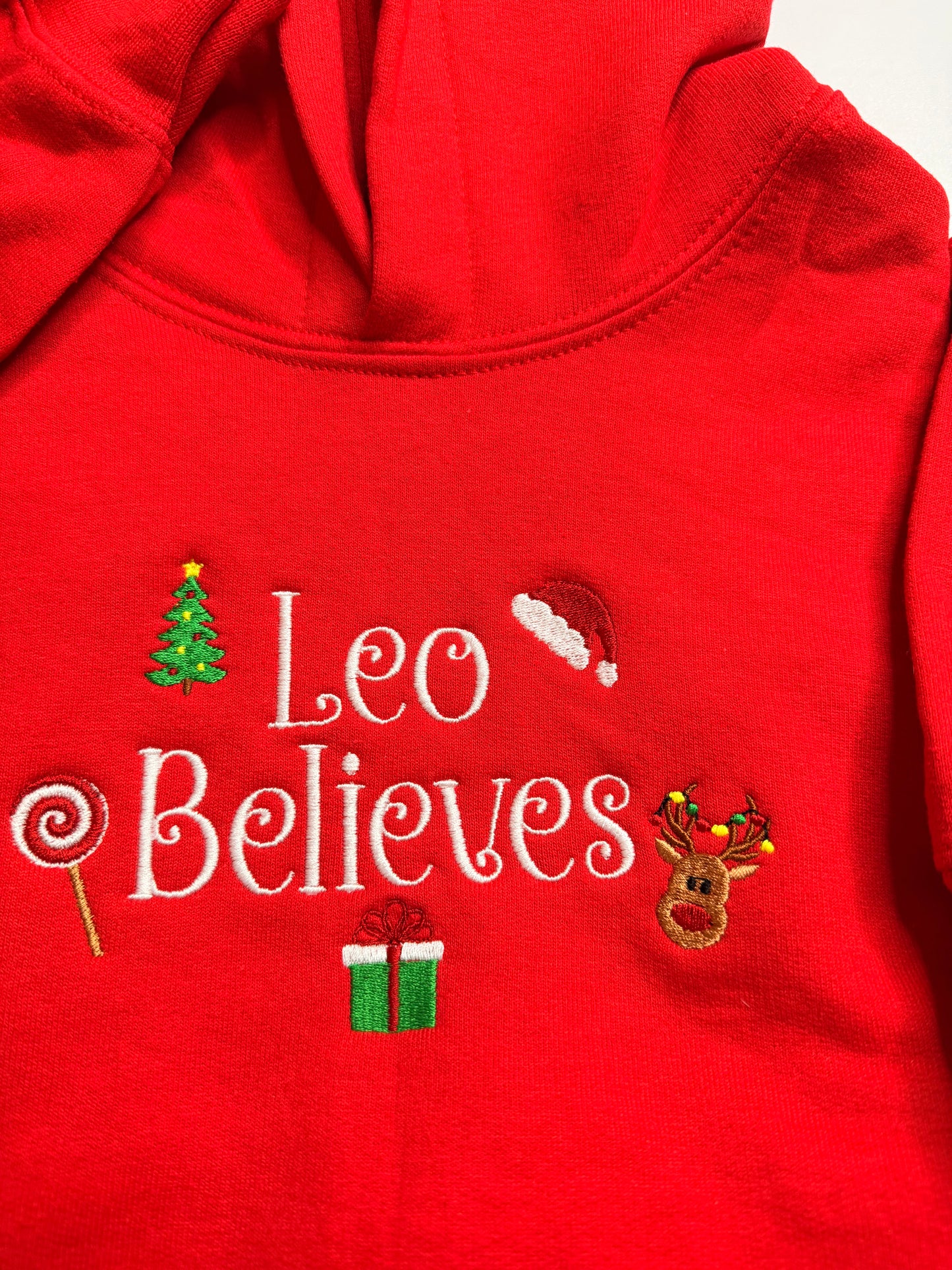 Embroidered Christmas "(Child's Name) Believes" Hooded Sweatshirt