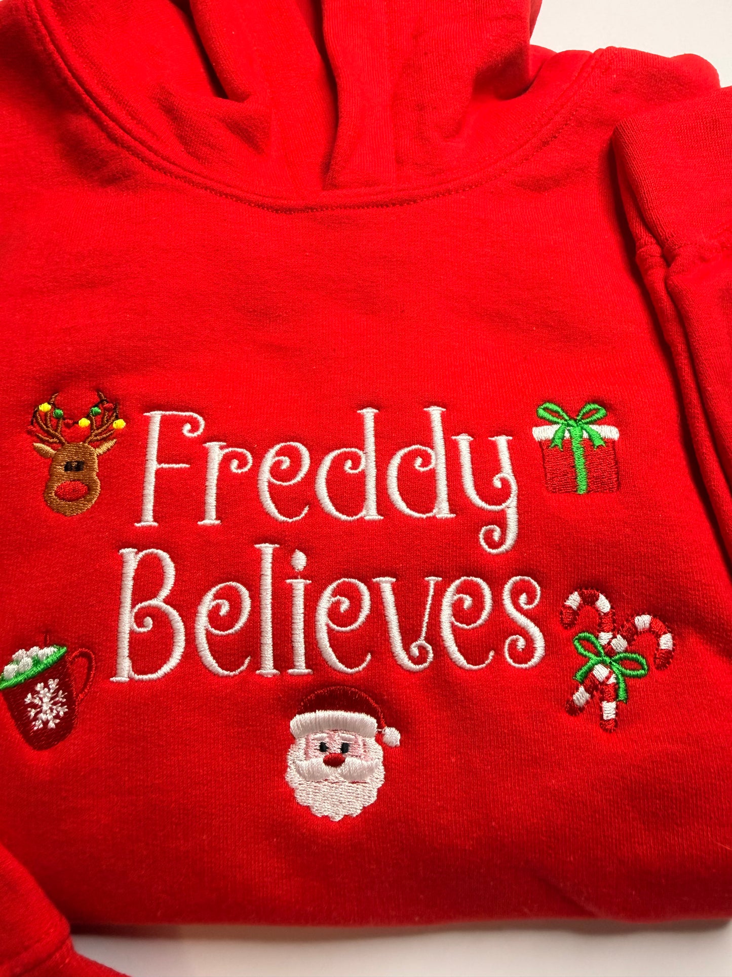 Embroidered Christmas "(Child's Name) Believes" Hooded Sweatshirt